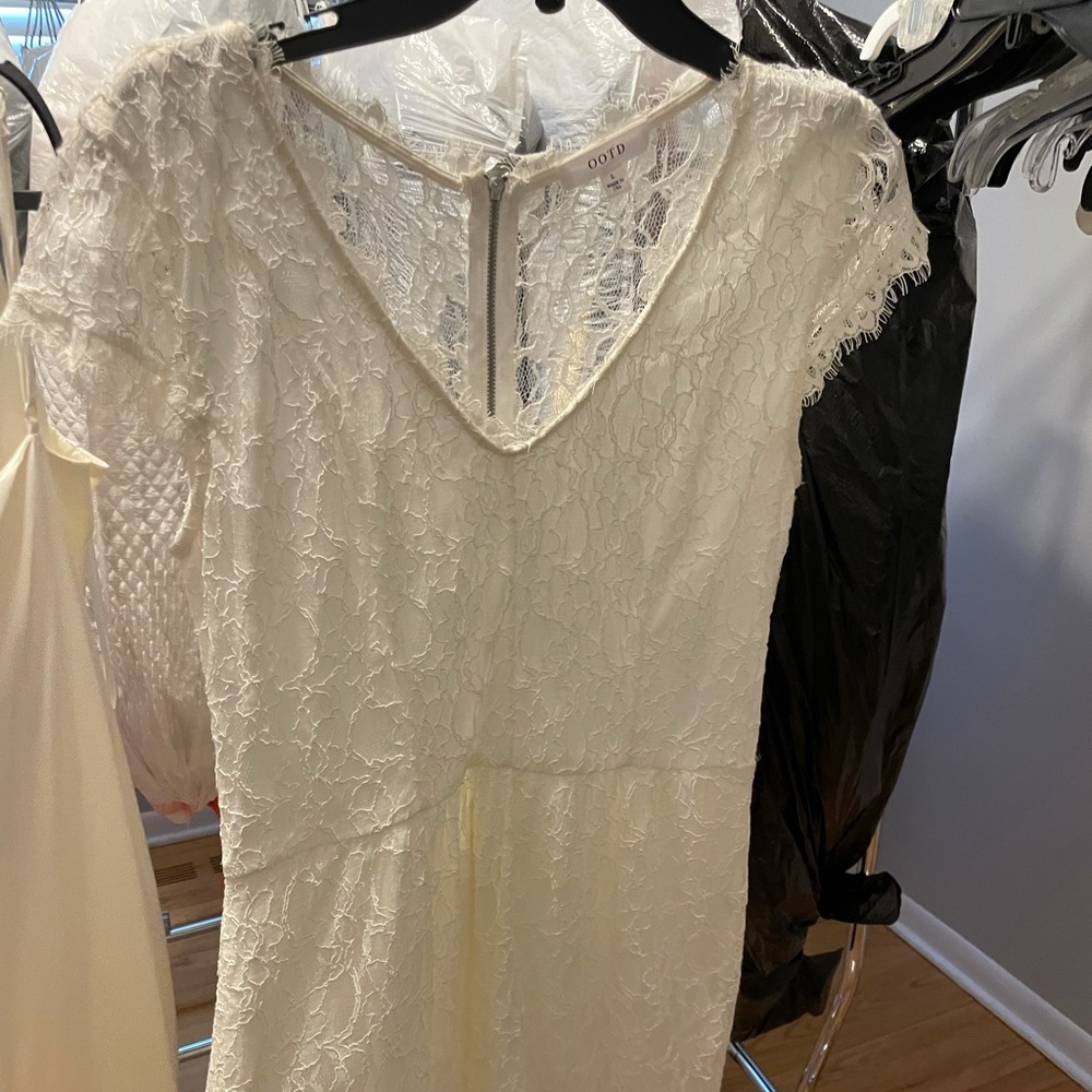 White lace dress, short and stunning . A bit sheer